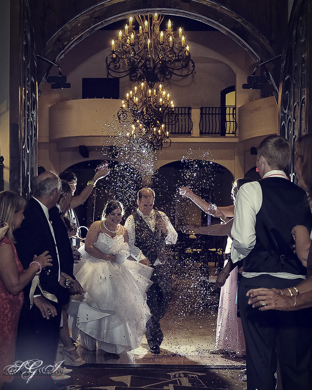 A grand exit through confetti in the Carillon Ballroom at The Bell Tower on 34th